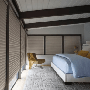 Cellular shades in a bedroom